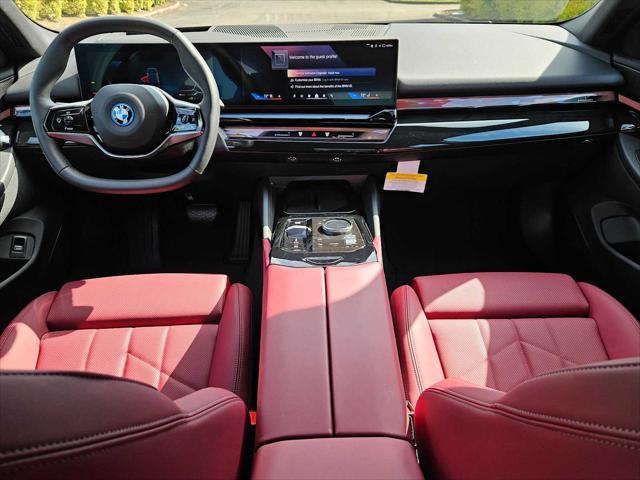 used 2024 BMW i5 car, priced at $61,190