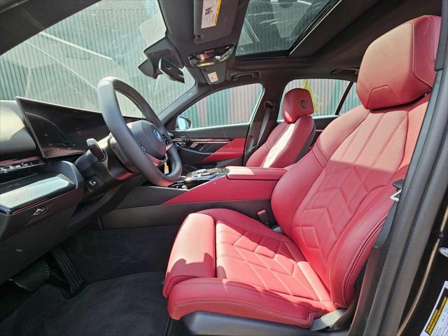used 2024 BMW i5 car, priced at $61,190