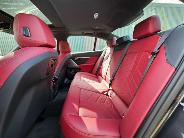 used 2024 BMW i5 car, priced at $61,190