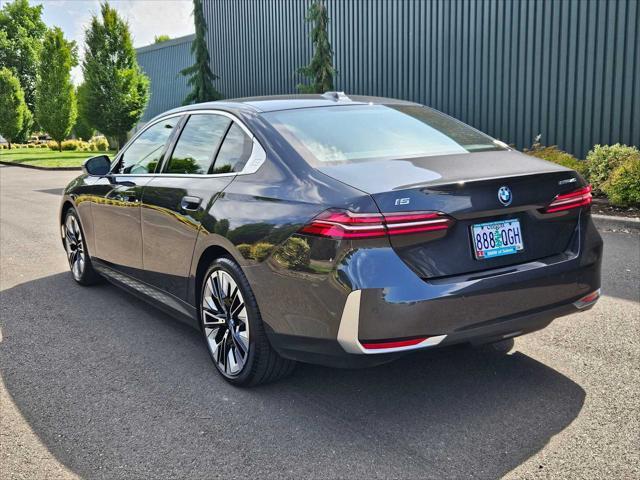 used 2024 BMW i5 car, priced at $61,190