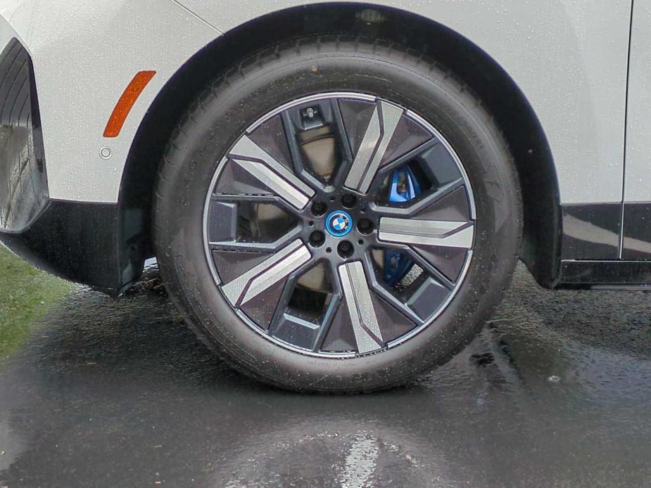 new 2024 BMW iX car, priced at $97,050