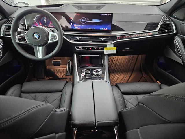 new 2025 BMW X6 car, priced at $85,380