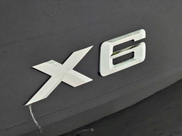 new 2025 BMW X6 car, priced at $85,380