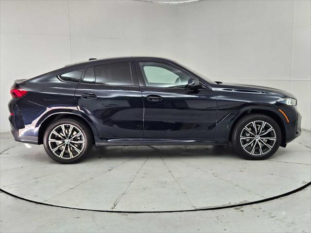new 2025 BMW X6 car, priced at $85,380