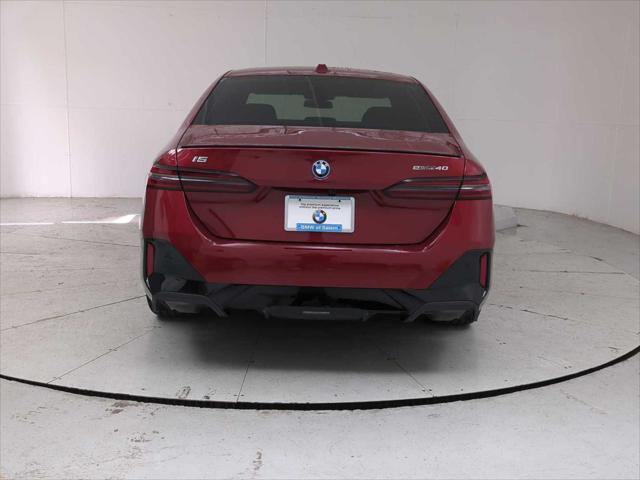 used 2024 BMW i5 car, priced at $56,490