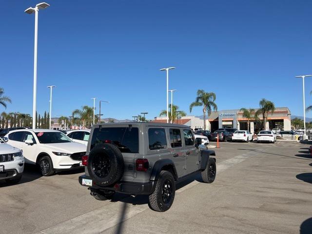 used 2021 Jeep Wrangler Unlimited car, priced at $35,498