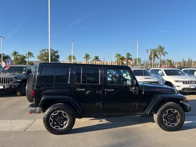 used 2015 Jeep Wrangler Unlimited car, priced at $24,702