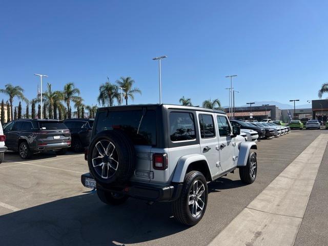 used 2024 Jeep Wrangler 4xe car, priced at $39,858