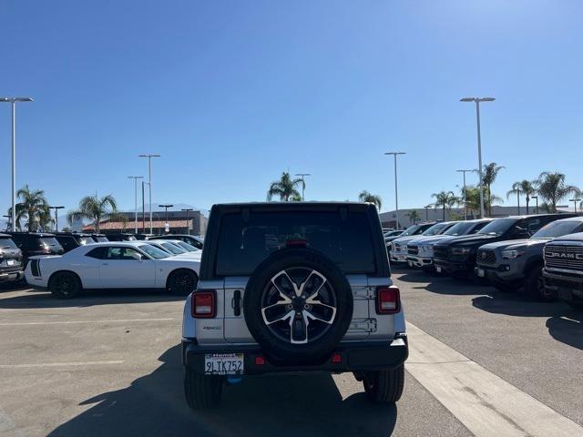 used 2024 Jeep Wrangler 4xe car, priced at $39,858