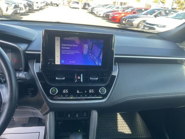 used 2024 Toyota Corolla Cross Hybrid car, priced at $34,998