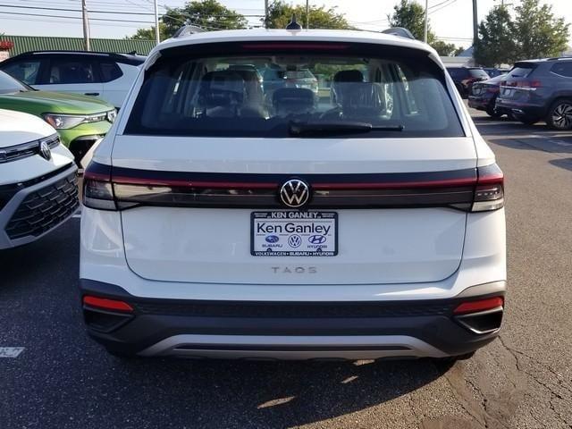 new 2025 Volkswagen Taos car, priced at $26,903