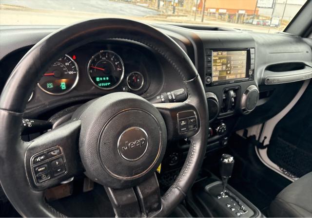 used 2016 Jeep Wrangler Unlimited car, priced at $17,850