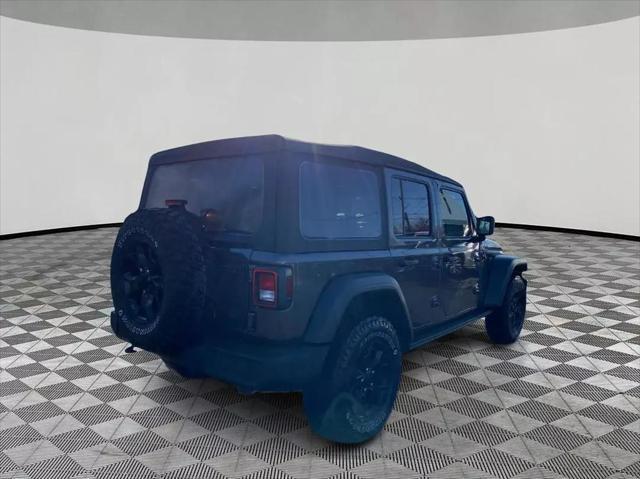 used 2021 Jeep Wrangler Unlimited car, priced at $31,599