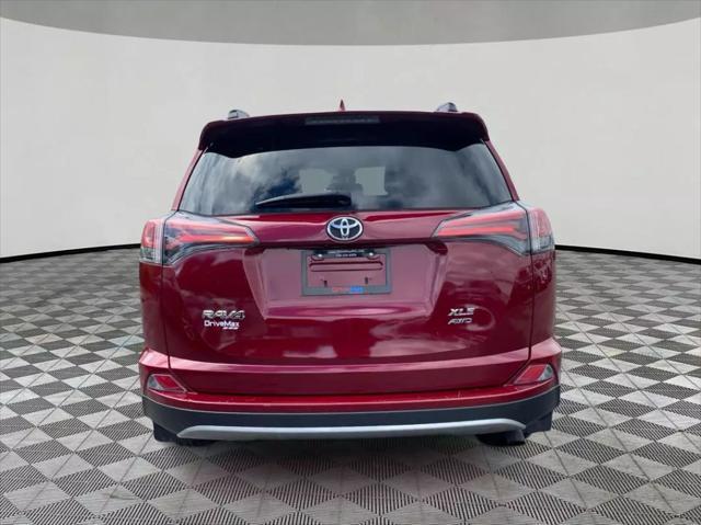 used 2018 Toyota RAV4 car, priced at $19,299