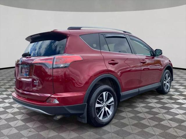 used 2018 Toyota RAV4 car, priced at $19,299