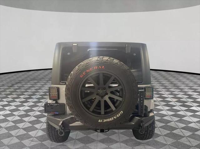 used 2015 Jeep Wrangler Unlimited car, priced at $22,899