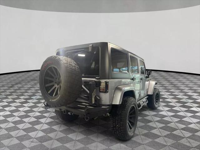 used 2015 Jeep Wrangler Unlimited car, priced at $22,899