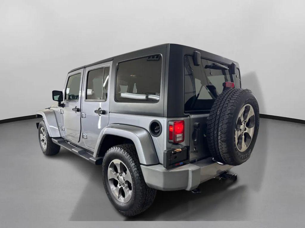 used 2018 Jeep Wrangler JK Unlimited car, priced at $17,199