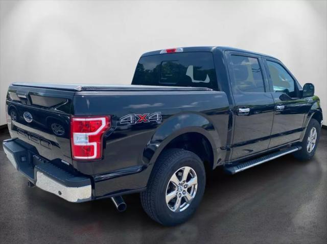 used 2018 Ford F-150 car, priced at $23,399