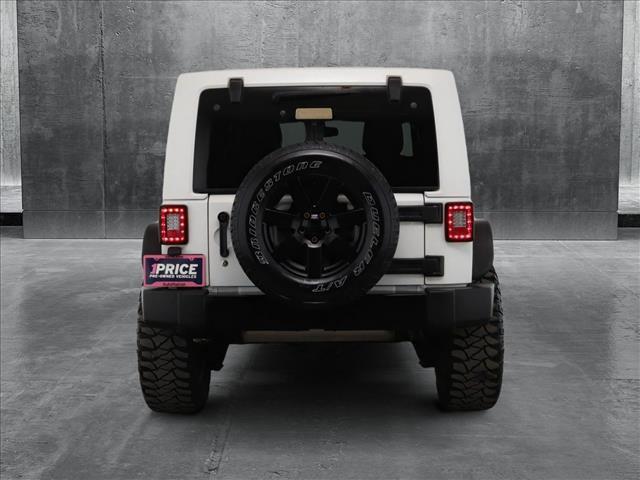 used 2014 Jeep Wrangler Unlimited car, priced at $16,998