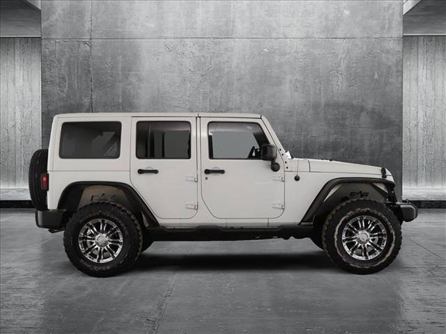 used 2014 Jeep Wrangler Unlimited car, priced at $16,998