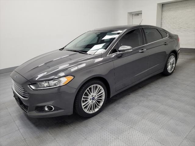 used 2016 Ford Fusion car, priced at $15,395