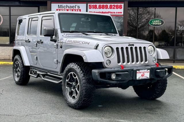 used 2014 Jeep Wrangler Unlimited car, priced at $25,497