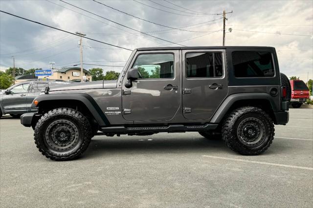 used 2018 Jeep Wrangler JK Unlimited car, priced at $22,997