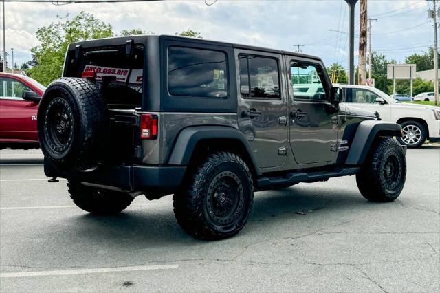 used 2018 Jeep Wrangler JK Unlimited car, priced at $22,997