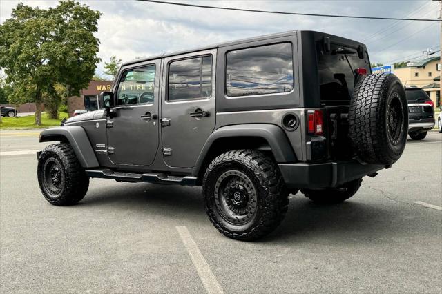 used 2018 Jeep Wrangler JK Unlimited car, priced at $22,997