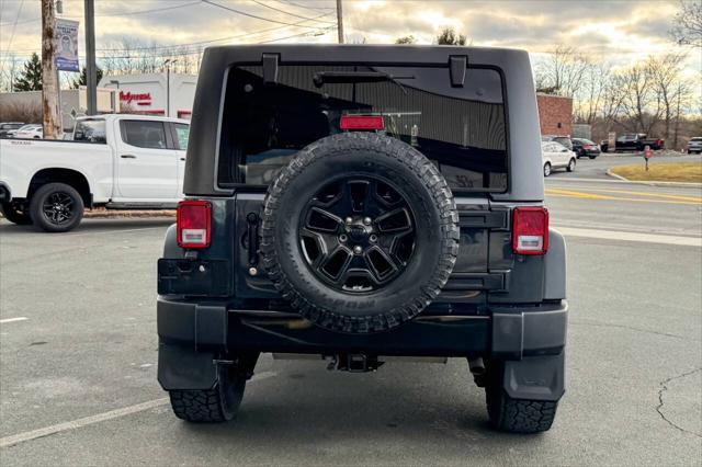 used 2018 Jeep Wrangler JK Unlimited car, priced at $22,997