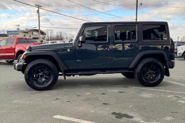 used 2018 Jeep Wrangler JK Unlimited car, priced at $22,997