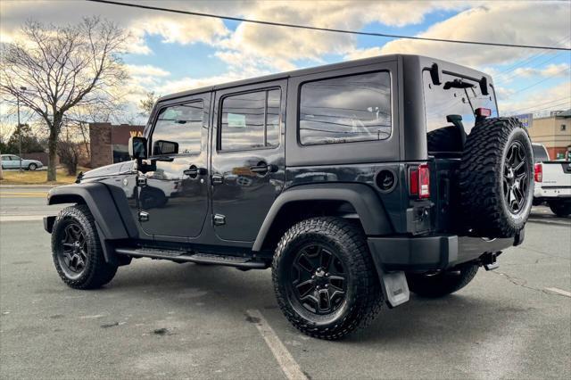 used 2018 Jeep Wrangler JK Unlimited car, priced at $22,997