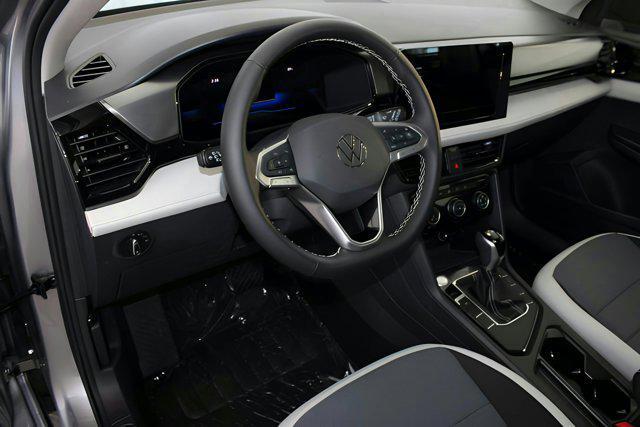 new 2025 Volkswagen Taos car, priced at $27,011