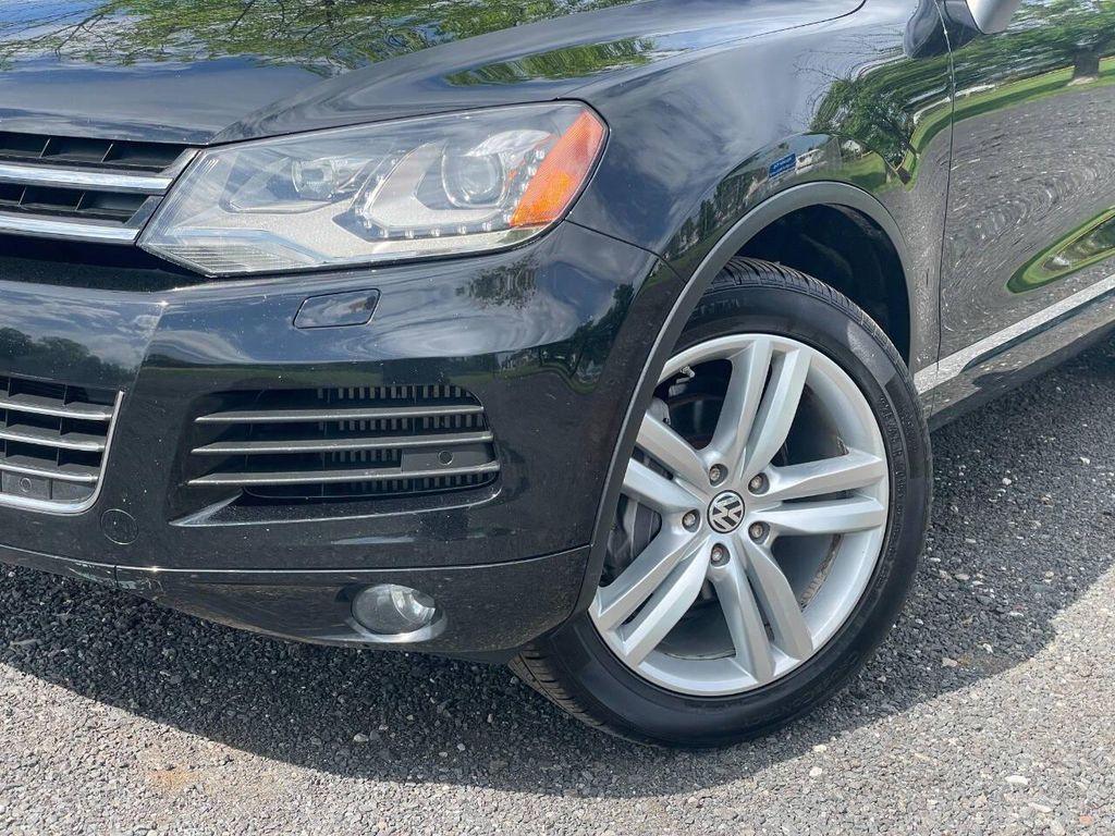 used 2014 Volkswagen Touareg car, priced at $10,300