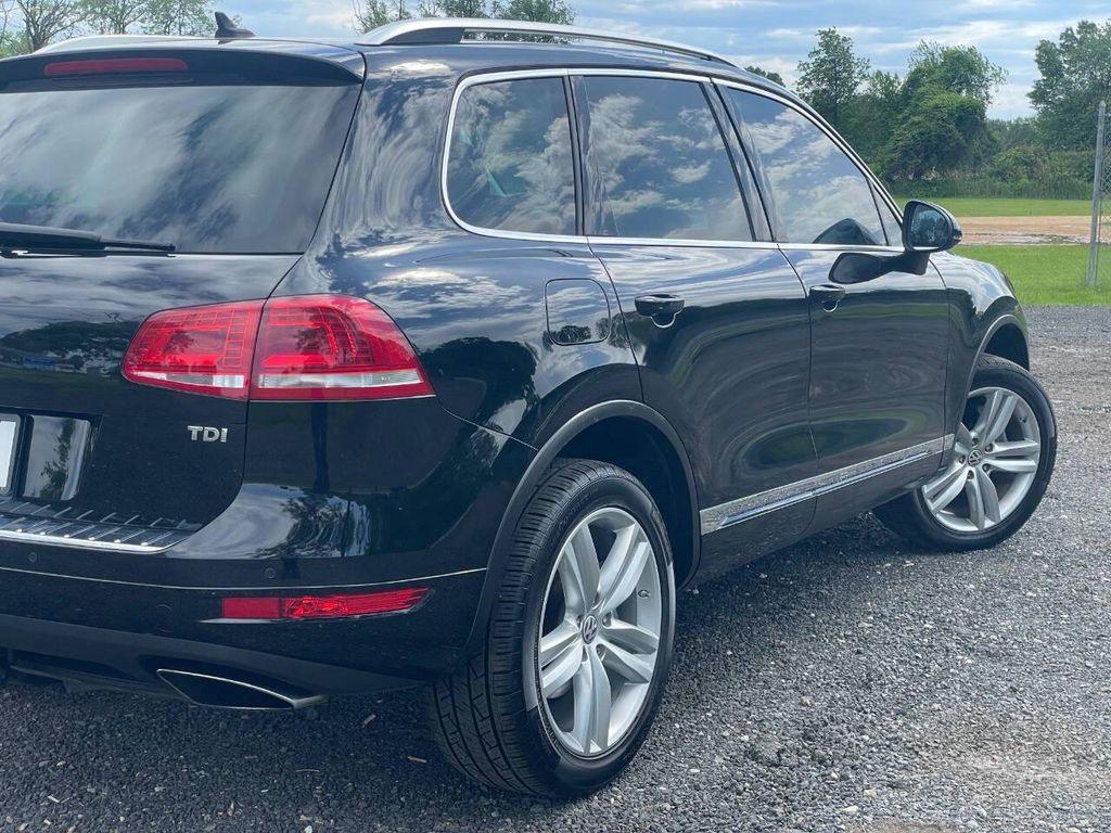 used 2014 Volkswagen Touareg car, priced at $10,300
