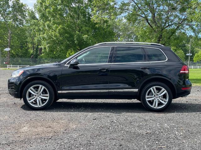 used 2014 Volkswagen Touareg car, priced at $10,450