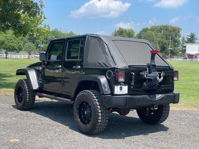 used 2010 Jeep Wrangler Unlimited car, priced at $12,650