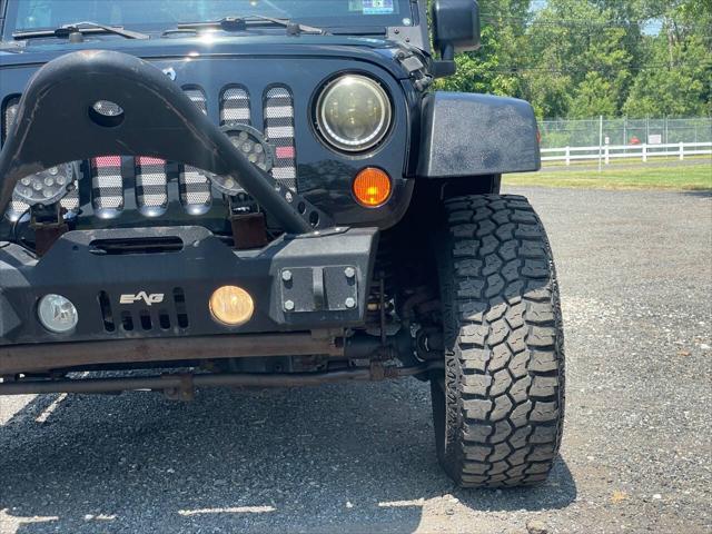 used 2010 Jeep Wrangler Unlimited car, priced at $12,650