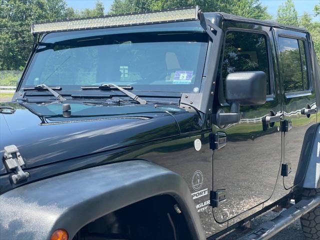 used 2010 Jeep Wrangler Unlimited car, priced at $12,650