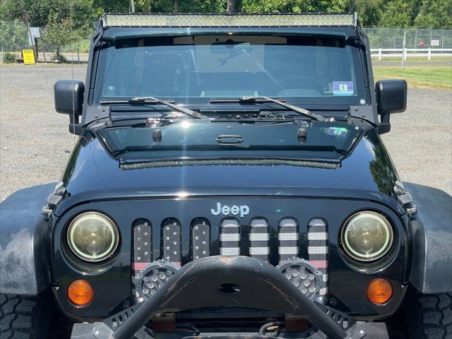 used 2010 Jeep Wrangler Unlimited car, priced at $12,650