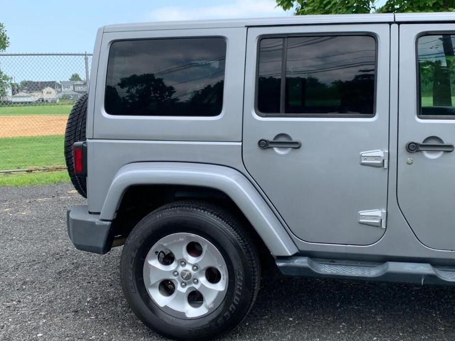 used 2014 Jeep Wrangler Unlimited car, priced at $15,990