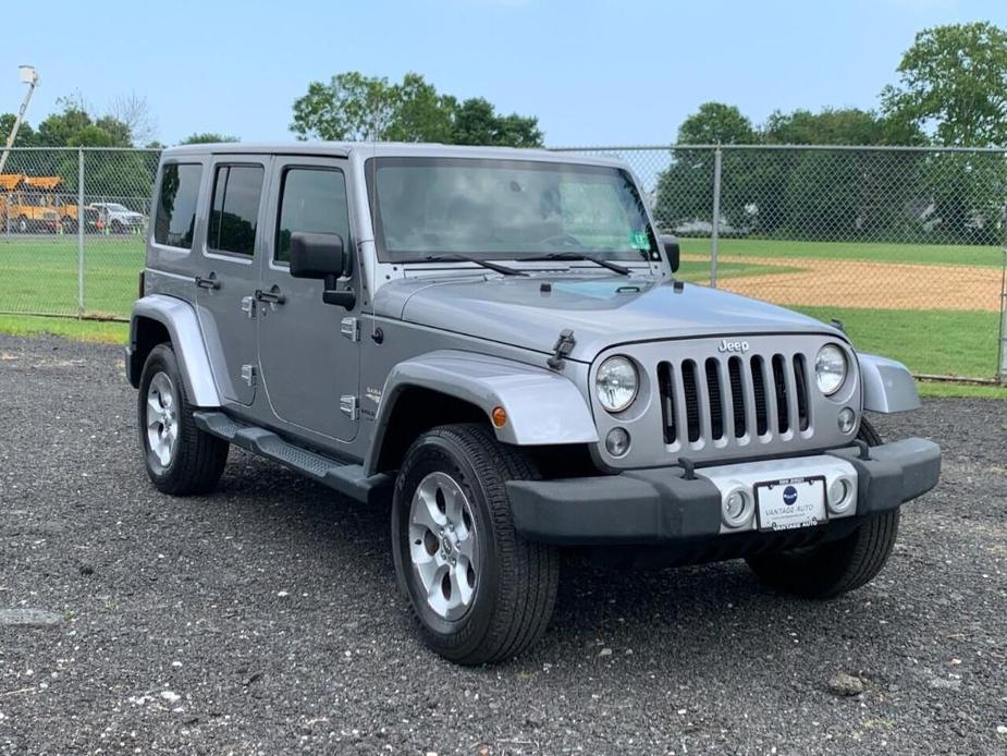 used 2014 Jeep Wrangler Unlimited car, priced at $15,990