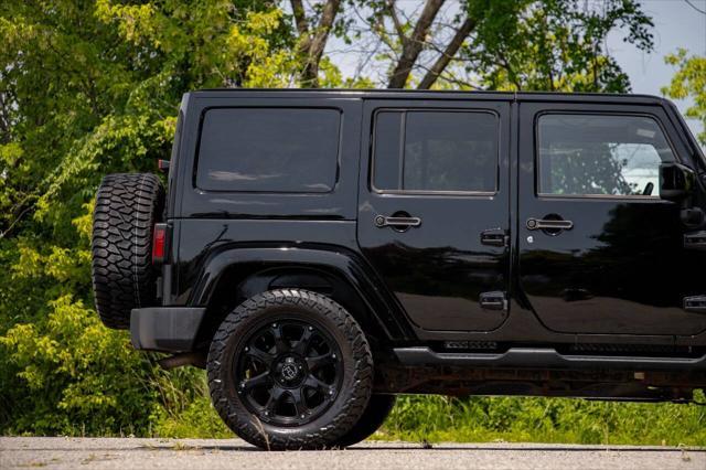 used 2014 Jeep Wrangler Unlimited car, priced at $20,180