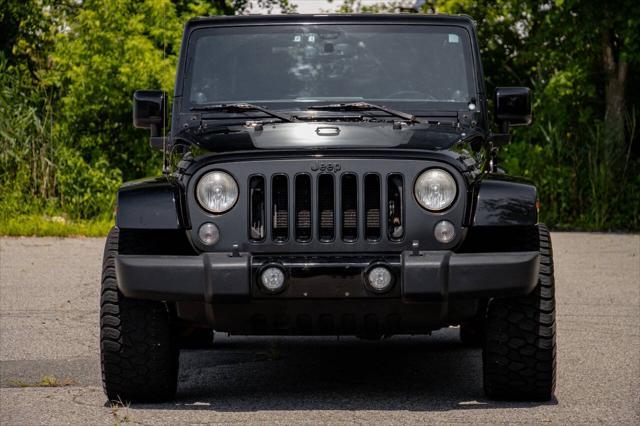 used 2014 Jeep Wrangler Unlimited car, priced at $20,180