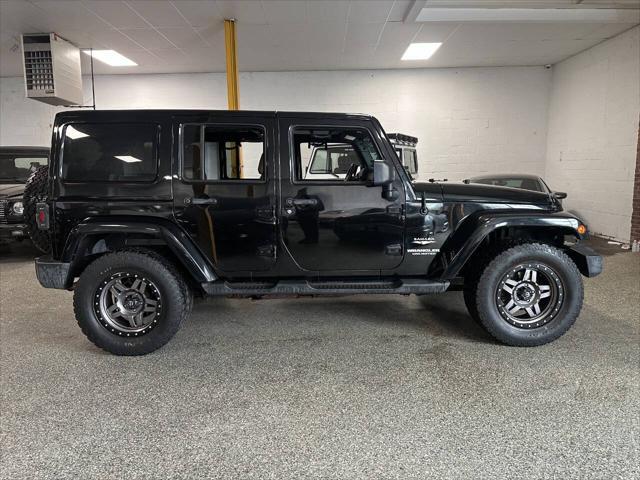 used 2011 Jeep Wrangler Unlimited car, priced at $10,450
