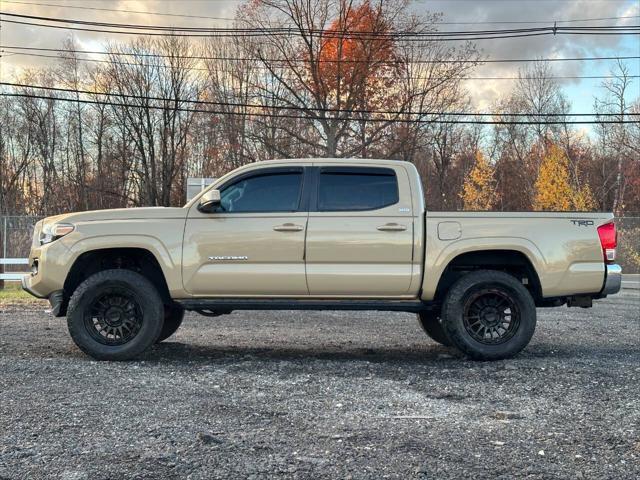 used 2017 Toyota Tacoma car, priced at $23,300