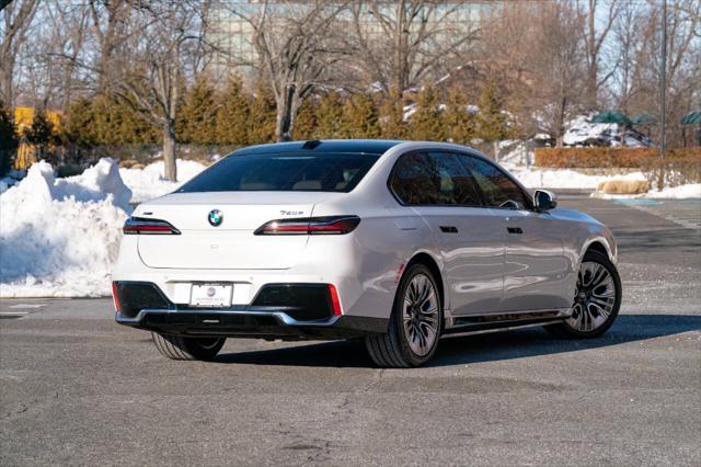 used 2024 BMW 750e car, priced at $81,900