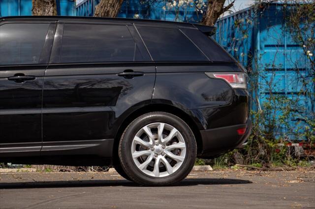 used 2014 Land Rover Range Rover Sport car, priced at $13,600