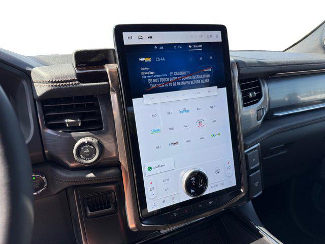 new 2025 Ford F-150 Lightning car, priced at $77,273